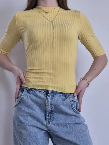 Majica je znamke Zara.